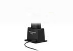 Three quarter front view of charging station for ultra-compact, yellow and black Ledlenser EXC7R rechargeable torch