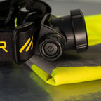 Close up of head of Ledlenser H15R Pro Headlamp sitting on hi-vis vest