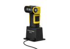 Three quarter front view of the ultra-compact, yellow and black Ledlenser EXC7R rechargeable torch. Shown in charger with charger plugged in