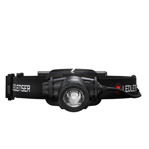 Front view of Ledlenser H7R Core rechargeable headlamp with red/black branded head strap and battery pack on back - Black | Ships Within New Zealand