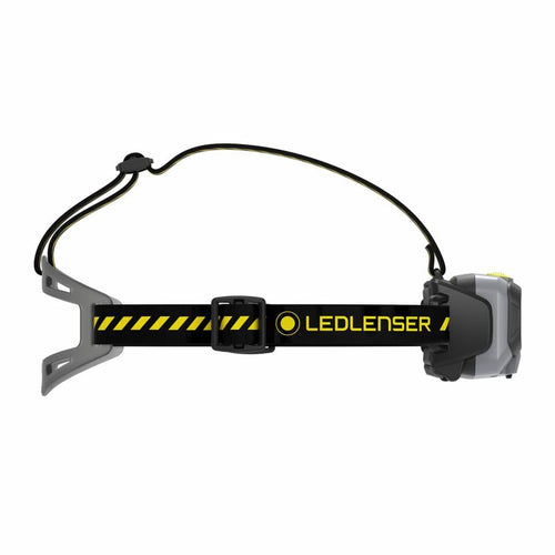 Side view of Ledlenser HF8R Work rechargeable headlamp with yellow/black branded overhead head strap with silicone comfort pad at back – Black  
