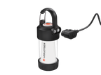 Side three quarter view the Ledlenser ML4 warm light rechargeable lantern with carabiner snap hook on top and showing magnetic charging port with charger cable positioned next to it - Black