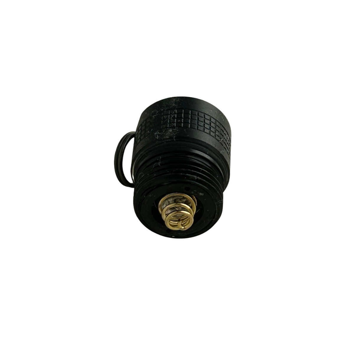 Three quarter interior end view of replacement switch cap for the Ledlenser P3 and P4 torches with split ring and battery spring showing - Black