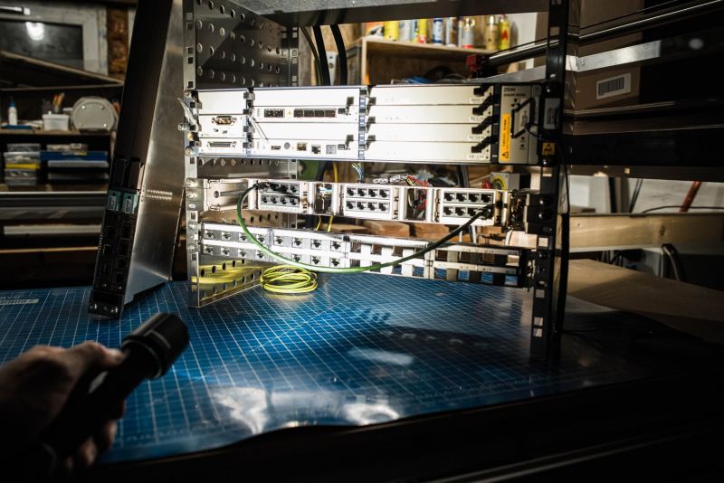 Person using the P7R Work UV Torch
to highlight electronics panels