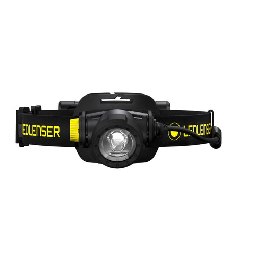 Front view of Ledlenser H7R Work rechargeable headlamp with yellow/black branded head strap and battery pack on back