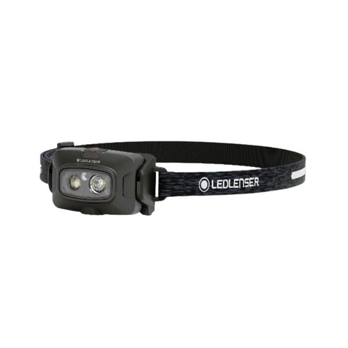 Three quarter front view of Ledlenser HF4R Core rechargeable headlamp with black/white branded head strap - Black