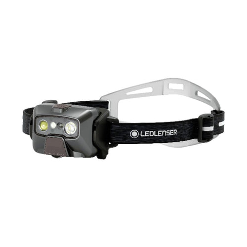 Three quarter front view of Ledlenser HF6R Signature rechargeable headlamp with branded head strap with silicone comfort pad at back - Black