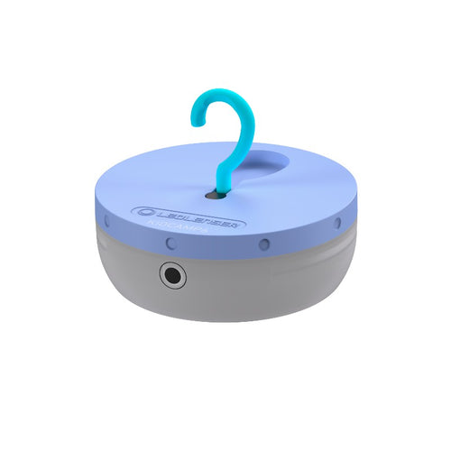 Three quarter view the Ledlenser Kidcamp lantern, round with a flat base and top. Fold out hook on top for mounting - Purple top/ Aqua Hook | LED502786